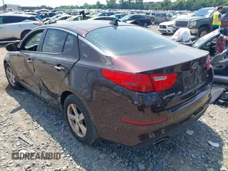 2015 Kia Optima LX with VIN 5XXGM4A70FG478819, listed as a IAAI auction lot 42571214 with 130,707 mi miles and . Bid and sale history available at DreamBid. Image 3.