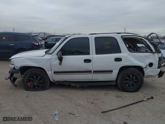 2004 Chevrolet Tahoe LT with VIN 1GNEC13Z74R313844, listed as a IAAI auction lot 41444672 with 233,620 mi miles. Bid and sale history available at carsss.com. Image 14.