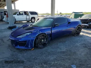 2021 Lotus Evora GT z VIN SCCLMDDN0MHA10373, wystawiony jako Copart lot #73548304 z przebiegiem 3936 mil mil oraz Szkody całkowita. Historia ofert i sprzedaży dostępna na DreamBid. Obrazek 1.