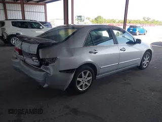2004 Honda Accord EX with VIN 1HGCM66594A049903, listed as a IAAI auction lot 42190573 with 218,663 mi miles and . Bid and sale history available at DreamBid. Image 4.