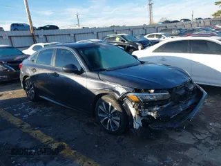 2024 Honda Civic Sedan EX with VIN 2HGFE1F77RH319511, listed as a IAAI auction lot 41424634 with 14,188 mi miles. Bid and sale history available at carsss.com. Image 1.