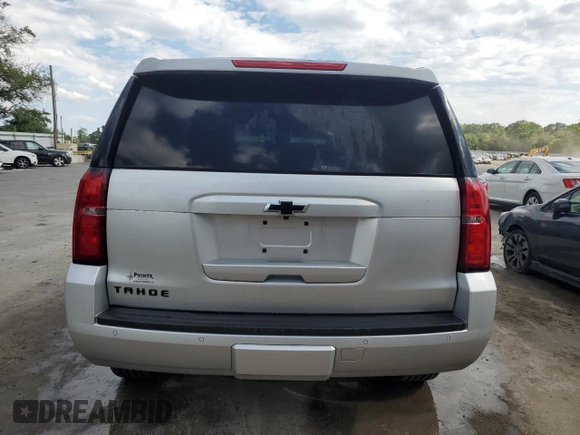 2018 Chevrolet Tahoe LT with VIN 1GNSKBKC6JR168185, listed as a Copart auction lot 55502305 with 96,905 mi miles and Salvage title. Bid and sale history available at DreamBid. Image 6.