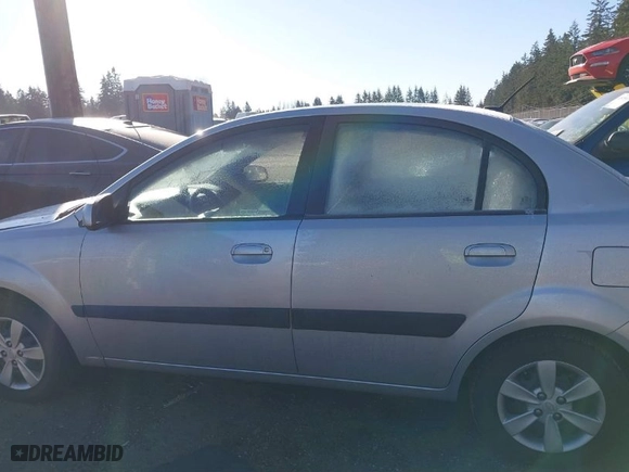 2009 Kia Rio with VIN KNADE223896549541, listed as a IAAI auction lot 41562013 with NaN miles. Bid and sale history available at carsss.com. Image 14.