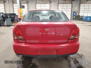 2000 Toyota ECHO z VIN JTDAT1232Y0096038, wystawiony jako Copart lot #86027274 z przebiegiem 83 392 mil mil oraz Nie do naprawy • Non repairable. Historia ofert i sprzedaży dostępna na DreamBid. Obrazek 6.