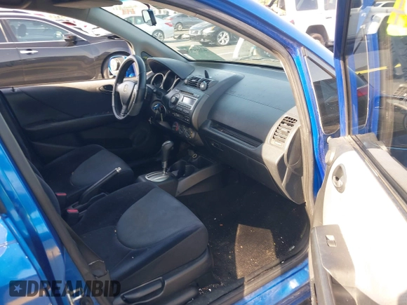 2007 Honda Fit Sport z VIN JHMGD38637S015957, wystawiony jako IAAI lot #42284728 z przebiegiem 176 383 mil mil oraz . Historia ofert i sprzedaży dostępna na DreamBid. Obrazek 5.
