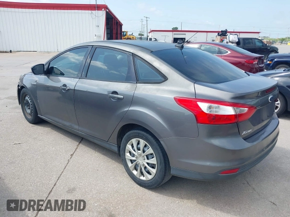 2012 Ford Focus SE z VIN 1FAHP3F24CL294391, wystawiony jako IAAI lot #42545359 z przebiegiem 190 904 mil mil oraz . Historia ofert i sprzedaży dostępna na DreamBid. Obrazek 3.