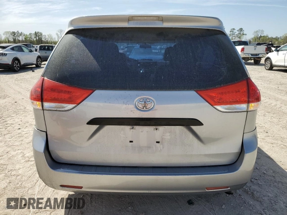 2012 Toyota Sienna with VIN 5TDKA3DC1CS012509, listed as a Copart auction lot 49906955 with 141,745 mi miles and Salvage Title. Bid and sale history available at DreamBid. Image 6.
