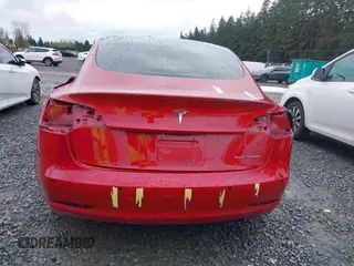 2018 Tesla Model 3 Long Range Battery z VIN 5YJ3E1EB2JF087823, wystawiony jako IAAI lot #41903609 z przebiegiem 69 749 mil mil oraz . Historia ofert i sprzedaży dostępna na DreamBid. Obrazek 17.