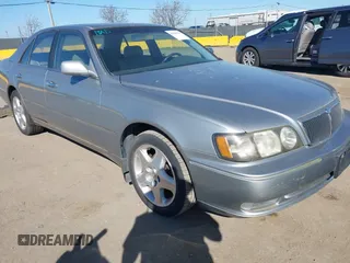 1999 Infiniti Q45 z VIN JNKBY31A8XM603290, wystawiony jako IAAI lot #41668113 z przebiegiem 144 251 mil mil oraz . Historia ofert i sprzedaży dostępna na DreamBid. Obrazek 1.