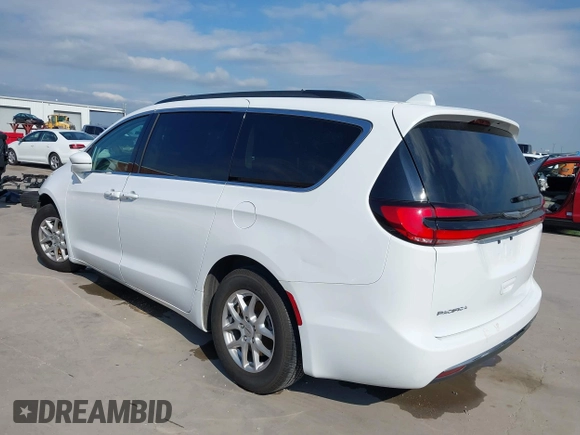 2022 Chrysler Pacifica Touring L with VIN 2C4RC1BG8NR197706, listed as a IAAI auction lot 42414290 with 56,972 mi miles and . Bid and sale history available at DreamBid. Image 3.