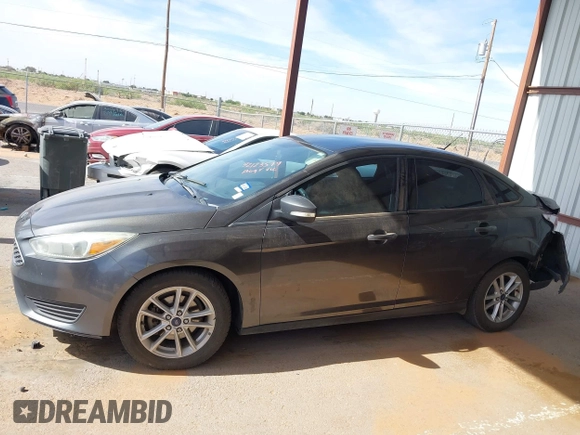 2015 Ford Focus SE with VIN 1FADP3F27FL374531, listed as a IAAI auction lot 42123579 with 128,884 mi miles and . Bid and sale history available at DreamBid. Image 14.