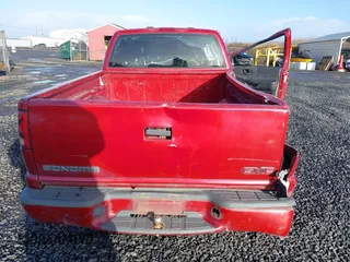 1999 GMC Sonoma with VIN 1GTCS1441XK501097, listed as a IAAI auction lot 41656623 with 162,160 mi miles. Bid and sale history available at carsss.com. Image 8.