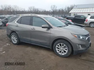 2018 Chevrolet Equinox LT z VIN 3GNAXJEV6JS593245, wystawiony jako IAAI lot #41700035 z przebiegiem 79 240 mil mil oraz . Historia ofert i sprzedaży dostępna na DreamBid. Obrazek 1.