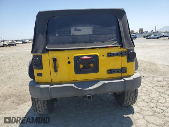 2008 Jeep Wrangler X with VIN 1J4FA24188L567678, listed as a Copart auction lot 60918635 with 185,368 mi miles and Salvage title. Bid and sale history available at DreamBid. Image 6.