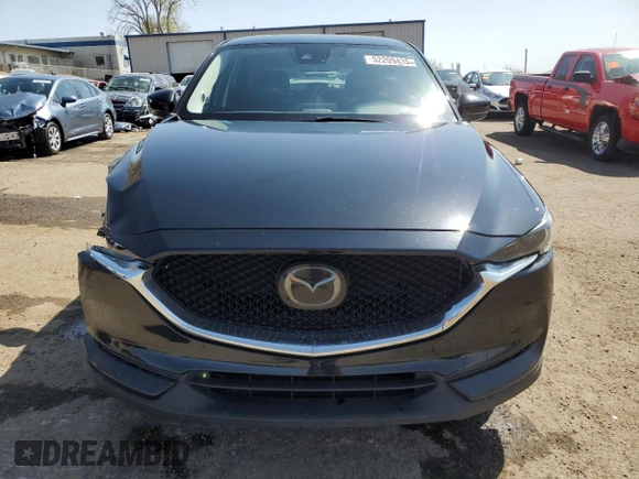 2018 Mazda CX-5 Grand Touring with VIN JM3KFADM9J1336792, listed as a Copart auction lot 52209435 with 107,852 mi miles and Salvage Title. Bid and sale history available at DreamBid. Image 5.