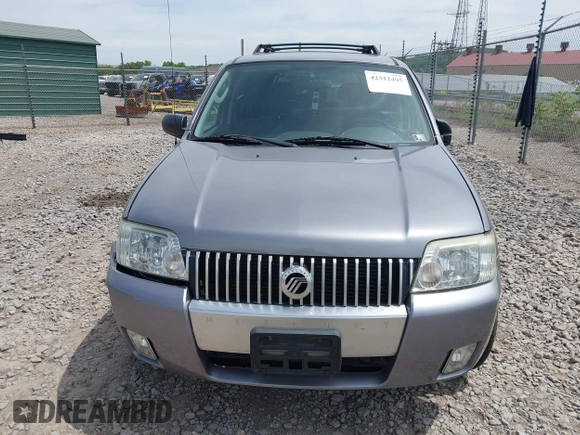 2007 Mercury Mariner Luxury with VIN 4M2CU91157KJ09026, listed as a IAAI auction lot 42312495 with 156,572 mi miles and . Bid and sale history available at DreamBid. Image 12.