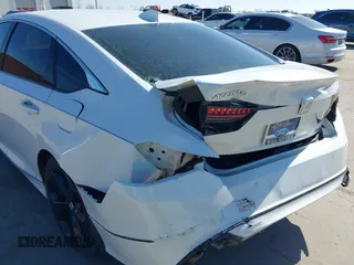 2018 Honda Accord Touring z VIN 1HGCV1F96JA144076, wystawiony jako IAAI lot #41561688 z przebiegiem 125 539 mil mil oraz . Historia ofert i sprzedaży dostępna na DreamBid. Obrazek 6.