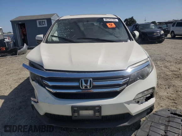 2018 Honda Pilot EX-L with VIN 5FNYF6H54JB013986, listed as a Copart auction lot 60743165 with 124,373 mi miles and Salvage title. Bid and sale history available at DreamBid. Image 5.