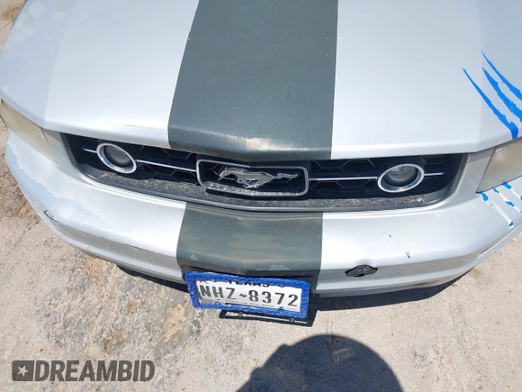 2007 Ford Mustang Deluxe with VIN 1ZVFT80N575247116, listed as a IAAI auction lot 42704286 with 169,931 mi miles and . Bid and sale history available at DreamBid. Image 6.