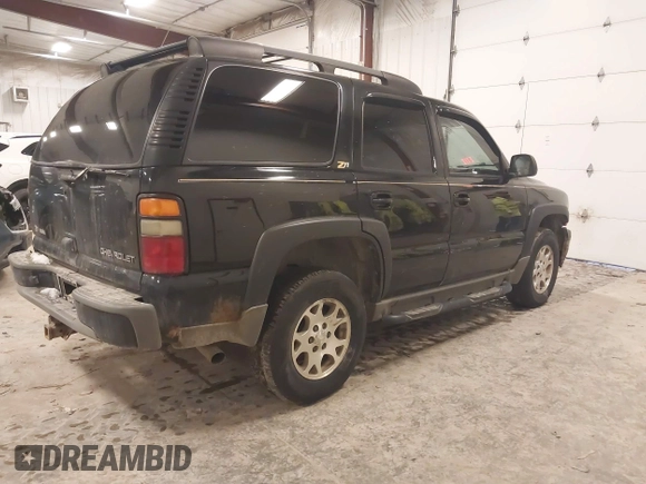 2004 Chevrolet Tahoe LS with VIN 1GNEK13T24R242907, listed as a IAAI auction lot 41496795 with 261,402 mi miles. Bid and sale history available at carsss.com. Image 4.