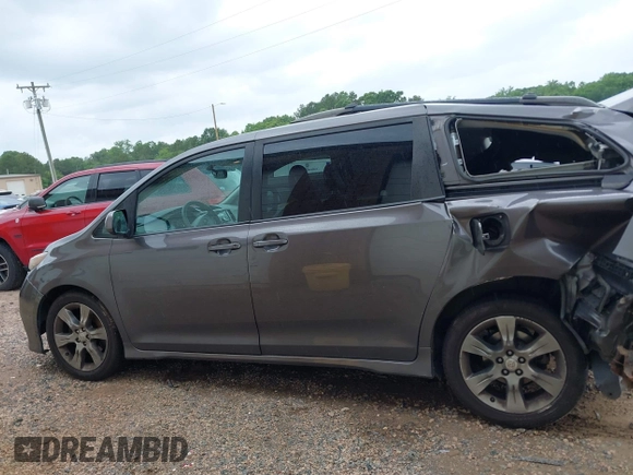 2012 Toyota Sienna SE with VIN 5TDXK3DC2CS235211, listed as a IAAI auction lot 42390354 with 242,602 mi miles and . Bid and sale history available at DreamBid. Image 15.