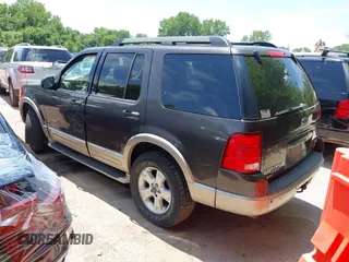2005 Ford Explorer Eddie Bauer z VIN 1FMDU74W25UB59367, wystawiony jako IAAI lot #42604103 z przebiegiem 276 955 mil mil oraz . Historia ofert i sprzedaży dostępna na DreamBid. Obrazek 3.
