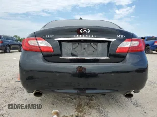 2013 Infiniti M with VIN JN1BY1AR3DM604891, listed as a Copart auction lot 68091914 with 128,799 mi miles and Clean Title. Bid and sale history available at DreamBid. Image 6.