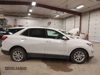 2018 Chevrolet Equinox LT z VIN 2GNAXSEV7J6138909, wystawiony jako IAAI lot #41295974 z przebiegiem 68 852 mil mil oraz . Historia ofert i sprzedaży dostępna na DreamBid. Obrazek 13.