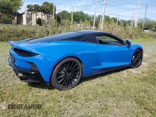 2020 McLaren GT z VIN SBM22GCA8LW000692, wystawiony jako Copart lot #44749324 z przebiegiem 18 911 mil mil oraz Nie do naprawy. Historia ofert i sprzedaży dostępna na DreamBid. Obrazek 3.