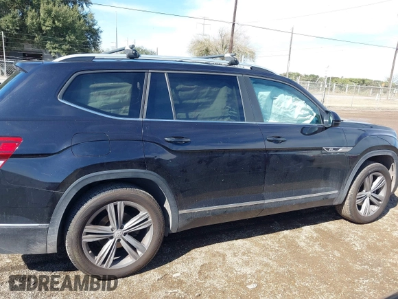 2018 Volkswagen Atlas SE with VIN 1V2FR2CA9JC537903, listed as a IAAI auction lot 41386874 with 118,764 mi miles and . Bid and sale history available at DreamBid. Image 14.