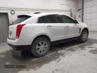 2015 Cadillac SRX Luxury Collection with VIN 3GYFNBE38FS596318, listed as a IAAI auction lot 42119660 with 45,178 mi miles. Bid and sale history available at carsss.com. Image 4.