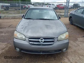2002 Nissan Maxima GXE z VIN JN1DA31DX2T418118, wystawiony jako IAAI lot #42344516 z przebiegiem 285 061 mil mil oraz . Historia ofert i sprzedaży dostępna na DreamBid. Obrazek 6.
