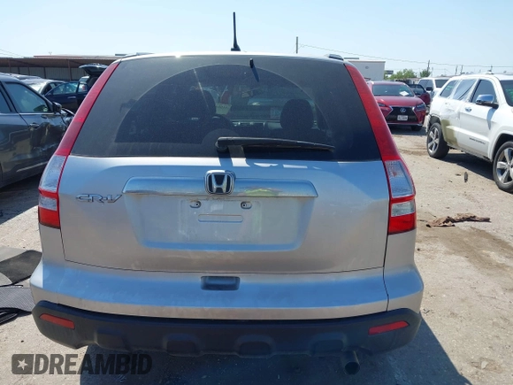 2009 Honda CR-V EX with VIN 3CZRE38559G705051, listed as a IAAI auction lot 42004200 with 185,218 mi miles and . Bid and sale history available at carsss.com. Image 16.