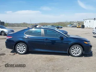 2019 Toyota Camry LE with VIN 4T1B11HK6KU276644, listed as a IAAI auction lot 42037249 with 23,677 mi miles and . Bid and sale history available at DreamBid. Image 13.