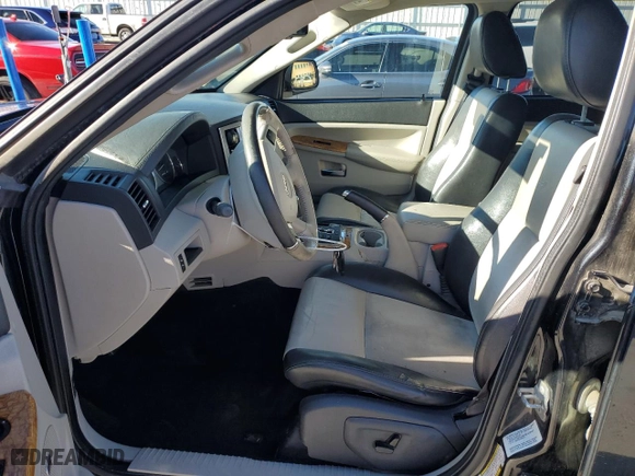 2009 Jeep Grand Cherokee Limited with VIN 1J8HR58T49C544722, listed as a Copart auction lot 86772094 with 100,010 mi miles and Salvage Title. Bid and sale history available at carsss.com. Image 7.