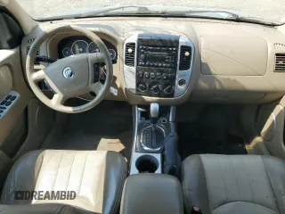 2005 Mercury Mariner Luxury z VIN 4M2YU57155DJ28005, wystawiony jako Copart lot #63460344 z przebiegiem 131 531 mil mil oraz Szkody całkowita. Historia ofert i sprzedaży dostępna na DreamBid. Obrazek 8.