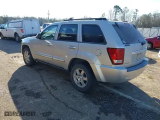 2010 Jeep Grand Cherokee Laredo with VIN 1J4PS4GK5AC156150, listed as a IAAI auction lot 41585346 with 178,237 mi miles. Bid and sale history available at carsss.com. Image 3.