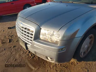 2007 Chrysler 300 Touring with VIN 2C3LA53G17H692540, listed as a IAAI auction lot 42021040 with 173,117 mi miles. Bid and sale history available at carsss.com. Image 14.