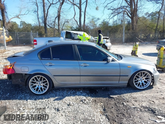 2003 BMW 3 Series 325i with VIN WBAEV33473KL61416, listed as a IAAI auction lot 41624573 with 288,961 mi miles and . Bid and sale history available at DreamBid. Image 14.