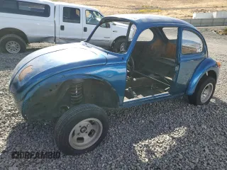 1973 Volkswagen Beetle with VIN 1332477215, listed as a Copart auction lot 77263164 with Not Provided miles and Salvage Title. Bid and sale history available at DreamBid. Image 1.