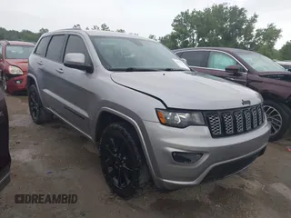 2018 Jeep Grand Cherokee Laredo E with VIN 1C4RJFAG6JC452859, listed as a IAAI auction lot 42647127 with 107,869 mi miles and . Bid and sale history available at DreamBid. Image 1.