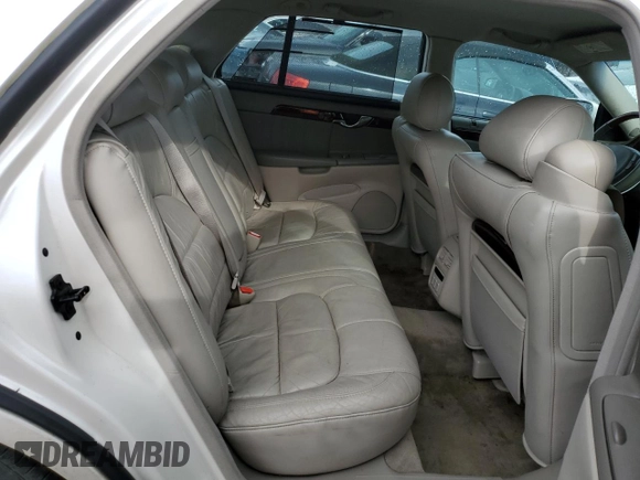 2002 Cadillac DeVille DHS z VIN 1G6KE57Y42U277428, wystawiony jako Copart lot #45757115 z przebiegiem 143 741 mil mil oraz Czysty tytuł • Clean title. Historia ofert i sprzedaży dostępna na DreamBid. Obrazek 10.