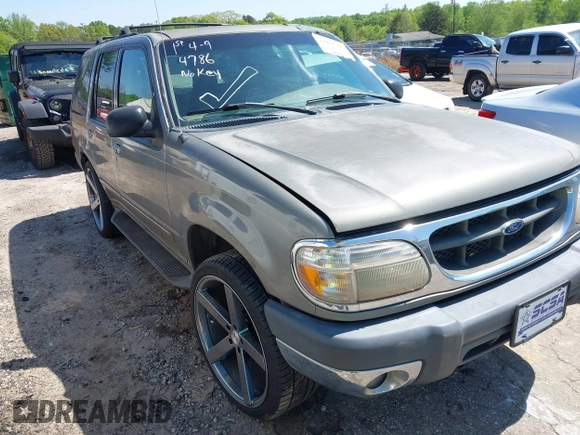 2000 Ford Explorer XLT with VIN 1FMZU63E0YZC65266, listed as a IAAI auction lot 42004786 with 273,397 mi miles and . Bid and sale history available at DreamBid. Image 1.