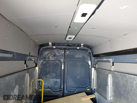 2020 Ford Transit Cargo z VIN 1FTBR3X86LKA48378, wystawiony jako Copart lot #52864655 z przebiegiem 119 031 mil mil oraz Szkoda całkowita • Salvage title. Historia ofert i sprzedaży dostępna na DreamBid. Obrazek 10.