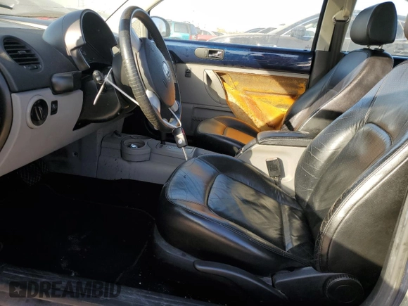 2004 Volkswagen Beetle with VIN 3VWCD31C74M421239, listed as a Copart auction lot 77025194 with Not Provided miles and Clean Title. Bid and sale history available at DreamBid. Image 7.