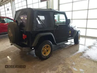 2006 Jeep Wrangler Sport with VIN 1J4FA49S96P733712, listed as a IAAI auction lot 41572913 with 93,511 mi miles. Bid and sale history available at carsss.com. Image 4.