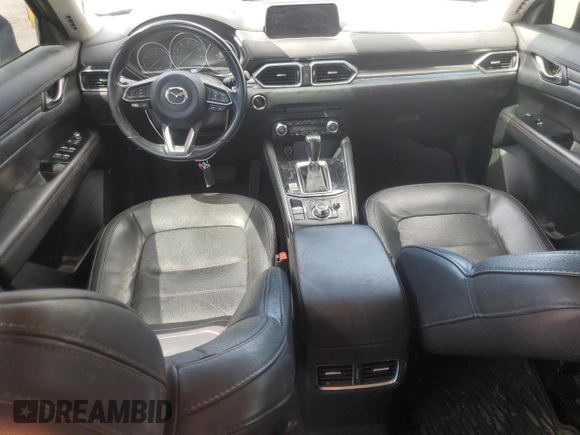 2018 Mazda CX-5 Grand Touring with VIN JM3KFBDM3J0323211, listed as a Copart auction lot 61166735 with Not provided miles and Salvage title. Bid and sale history available at DreamBid. Image 8.