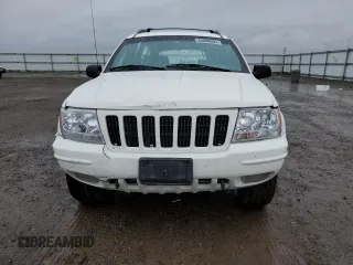 1999 Jeep Grand Cherokee Limited with VIN 1J4GW68N8XC707284, listed as a Copart auction lot 75548953 with 153,154 mi miles and Clean Title. Bid and sale history available at carsss.com. Image 5.