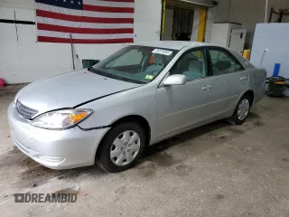2003 Toyota Camry LE with VIN 4T1BE32K33U710903, listed as a Copart auction lot 56976585 with 157,444 mi miles and Clean Title. Bid and sale history available at DreamBid. Image 1.