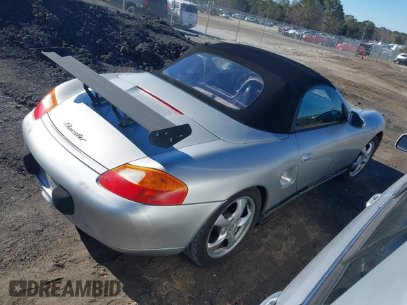 2001 Porsche Boxster with VIN WP0CA29871U627576, listed as a IAAI auction lot 41341939 with 122,500 mi miles. Bid and sale history available at carsss.com. Image 4.